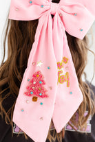 Pink oversized Christmas embellished hair bow with beaded Christmas tree and Joy details