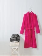 Cozy and soft plush microfleece shawl collar robes in pink, gray, and ivory with belts—perfect for lounging or gifting.